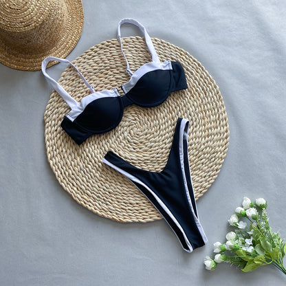 Trendsi black and white contrast bikini laid on woven mat with straw hat and white flowers