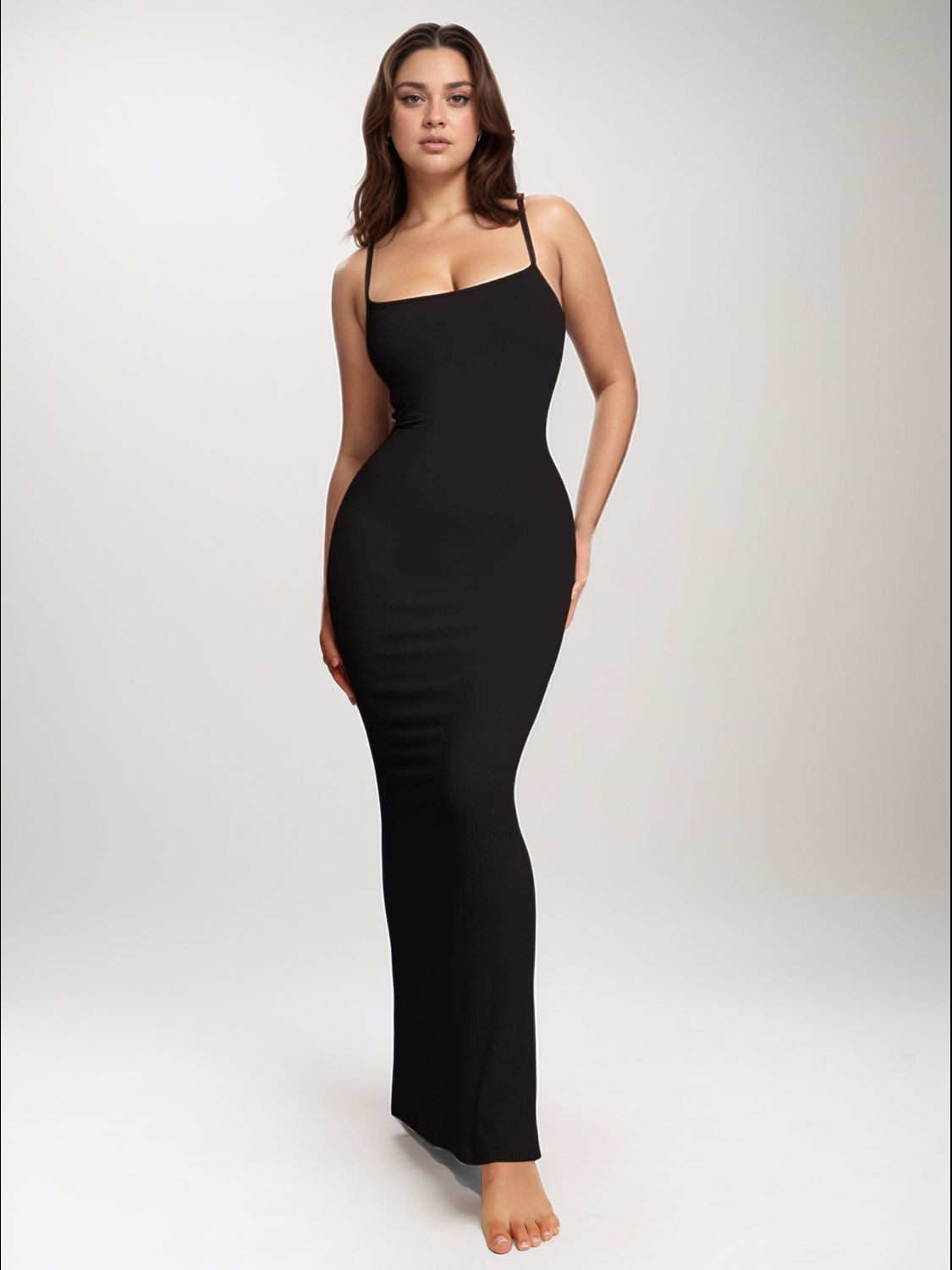 Trendsi black sleeveless bodycon dress for women with thin straps and long fitted design