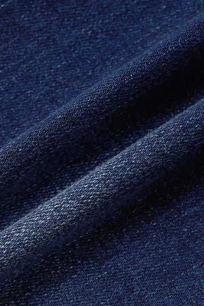 Trendsi close up of dark indigo denim fabric texture and drape for high waist wide leg embroidered jeans