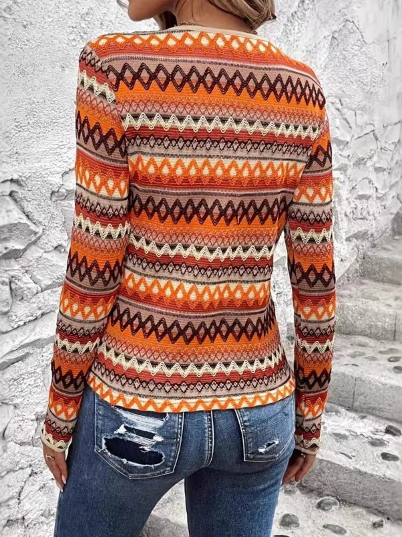 Trendsi patterned orange brown Fair Isle Long Sleeve T-Shirt fitted back view paired with distressed jeans