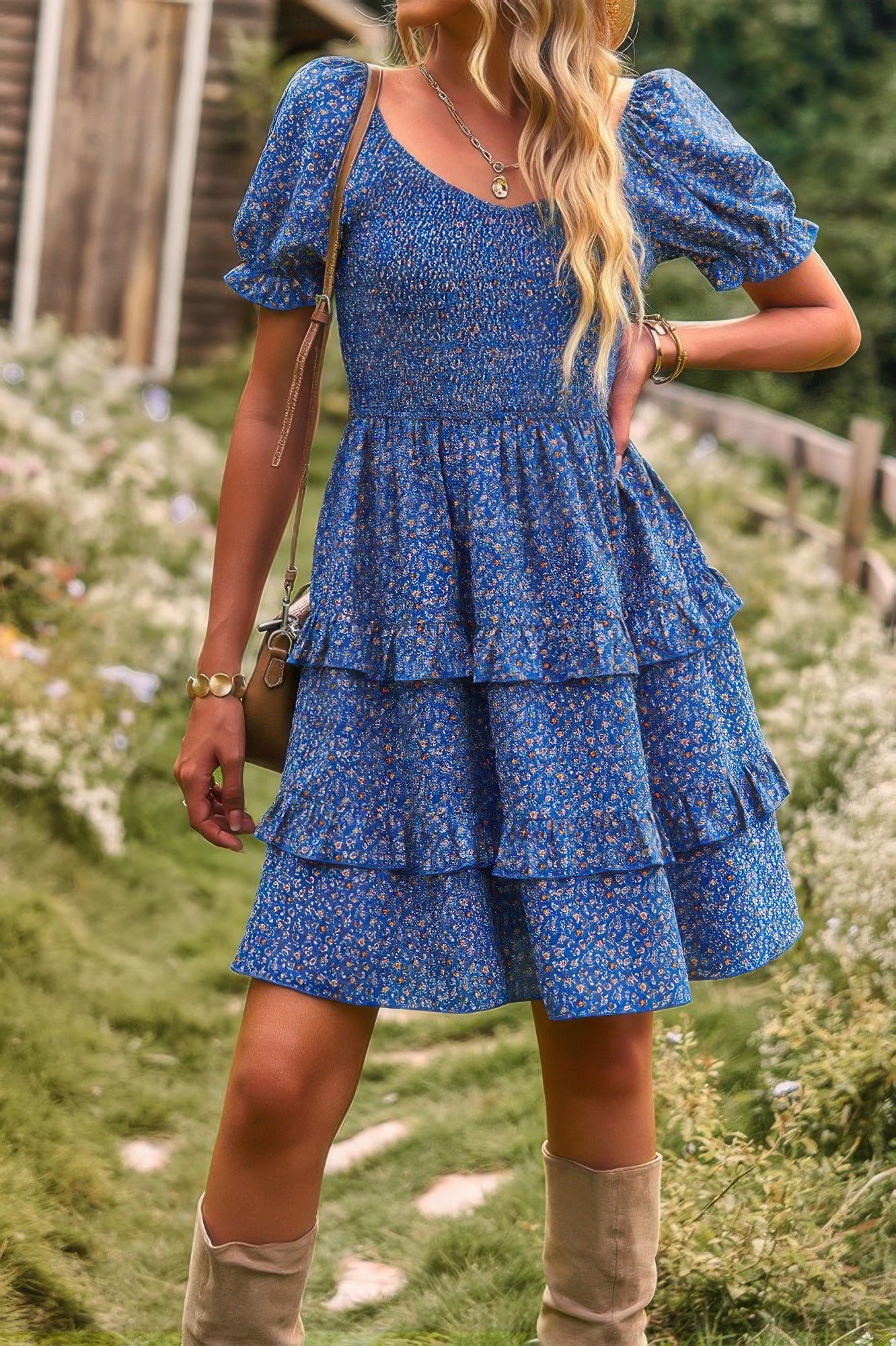 Blue floral print off shoulder dress with puff sleeves smocked bodice and tiered ruffle skirt in garden