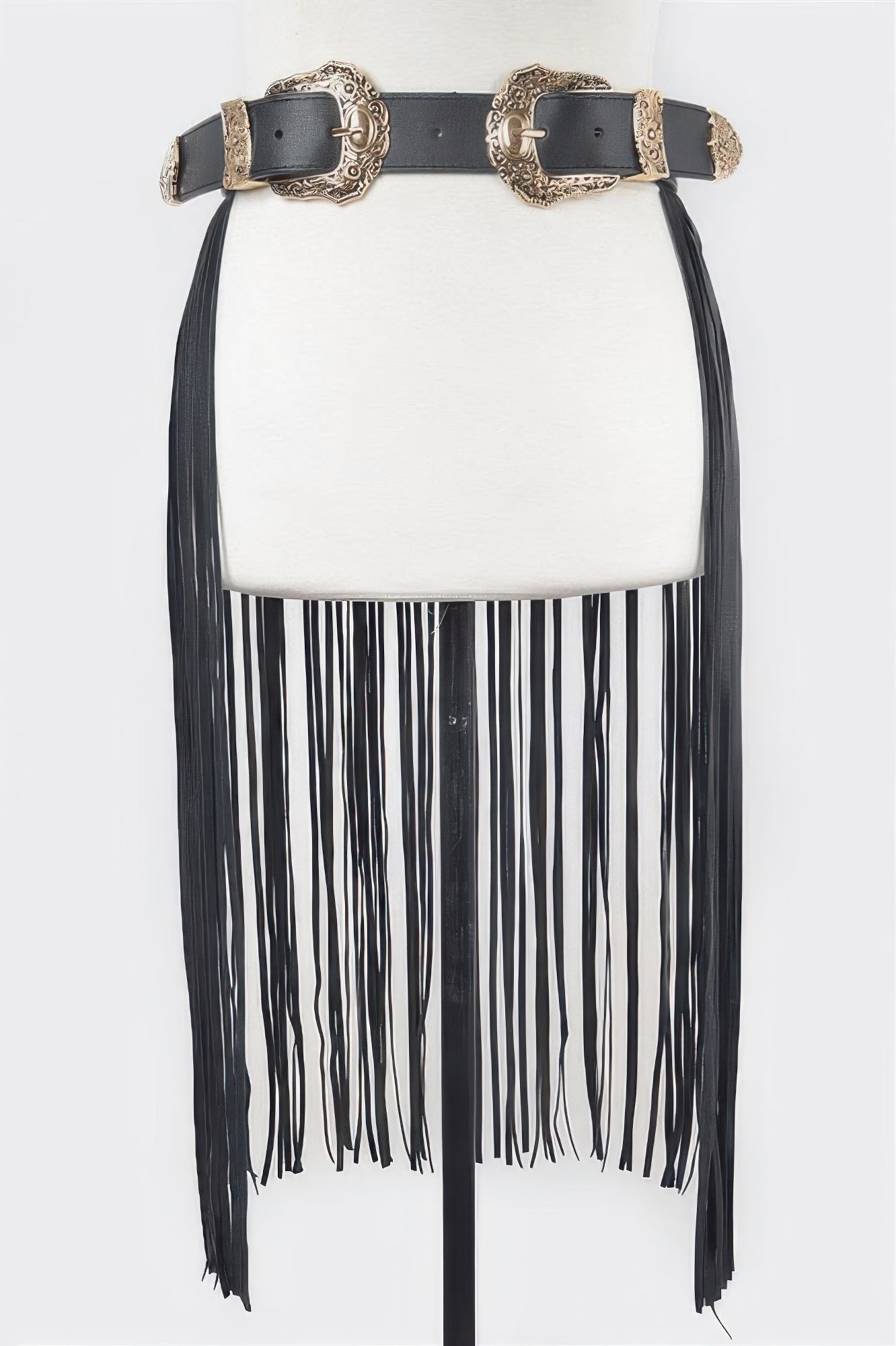 Black leather double buckle fringe belt with ornate gold buckles and long leather tassels on mannequin