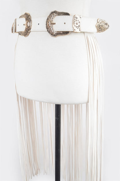 White leather double buckle fringe belt with ornate bronze buckles and long side fringe on mannequin