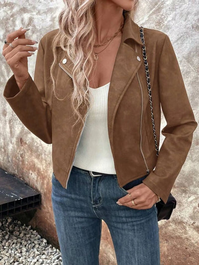 Trendsi women's suede moto jacket in camel brown worn over ribbed white tank with blue jeans and chain strap bag