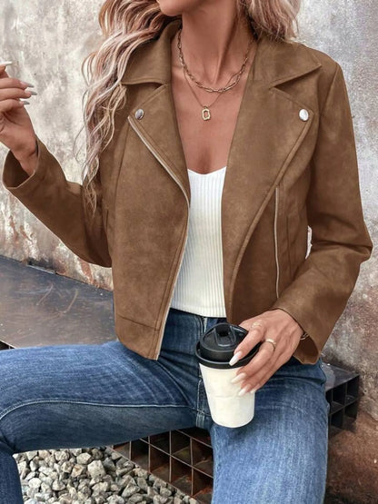 Trendsi women's suede moto jacket in tan with silver hardware cropped fit over ribbed tank holding coffee cup