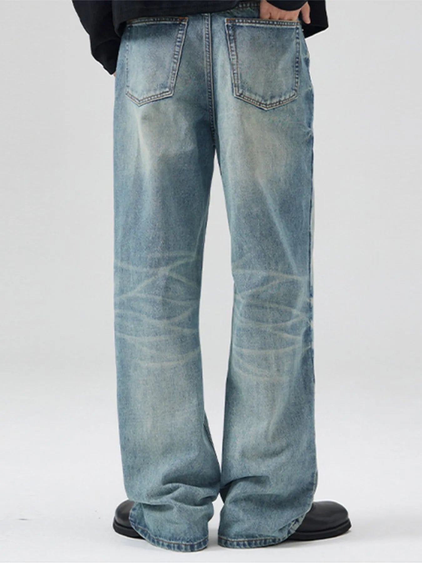 Trendsi light wash relaxed fit men's bootcut jeans plus size back view with faded whiskering