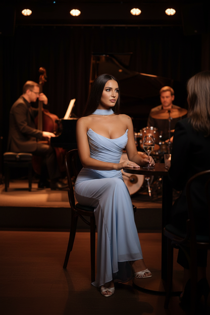 Brunette woman at jazz club wearing tube top and maxi skirt set