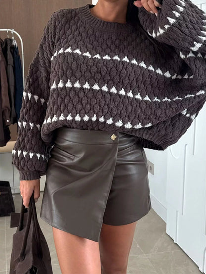 Chunky Knit Striped Sweater in dark brown and white paired with a chic leather skirt