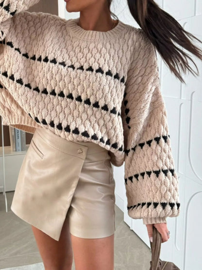 Trendsi Chunky Knit Striped Sweater in beige with black stripes, paired with a stylish mini skirt