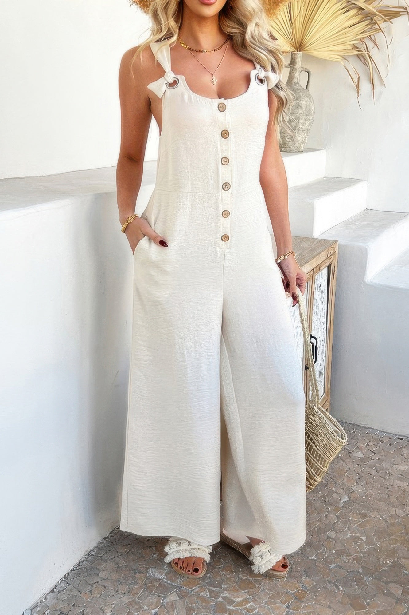 Wide Leg Jumpsuit cream button front with tie straps pockets and relaxed wide legs for casual summer