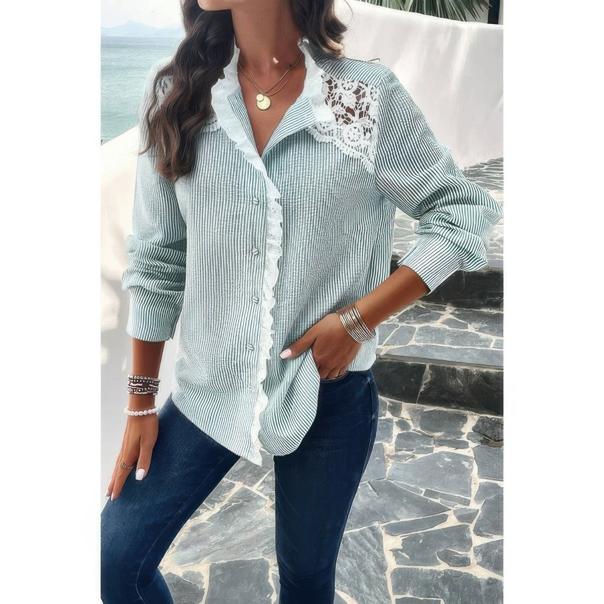 Woman wearing light green striped Button Front Shirt with lace shoulder detail and ruffled placket over jeans
