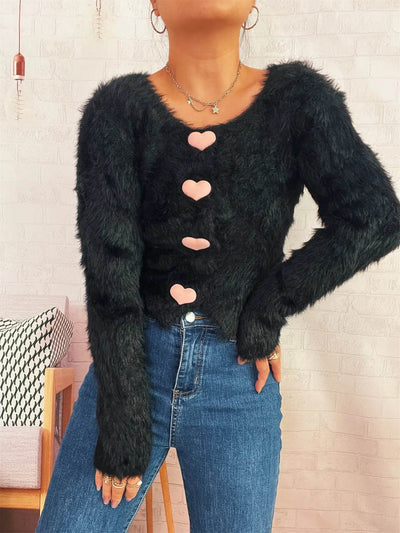 Trendsi Cozy Knit Sweater black fuzzy cropped cardigan with pink heart buttons styled with high waisted jeans
