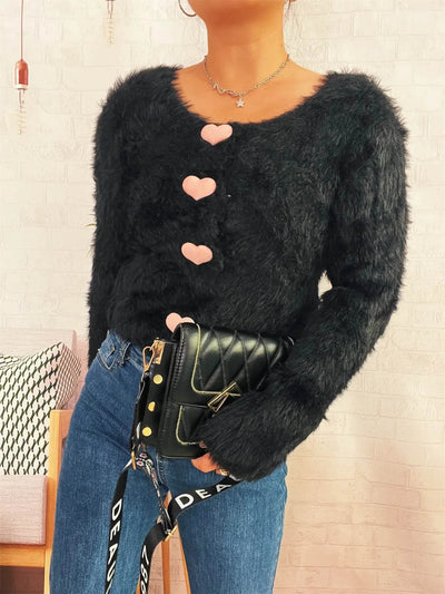 Trendsi Cozy Knit Sweater black fuzzy long sleeve with pink heart buttons styled with jeans and quilted bag