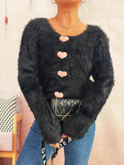 Trendsi Cozy Knit Sweater black fuzzy knit with pink heart buttons modeled with jeans and quilted bag
