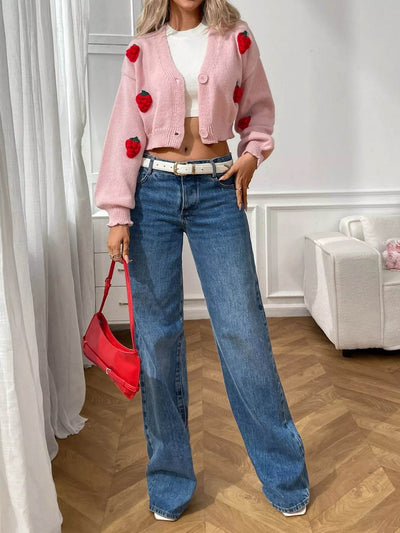 Trendsi Cropped Button-Up Cardigan in Pink with Floral Appliqués, paired with high-waisted jeans