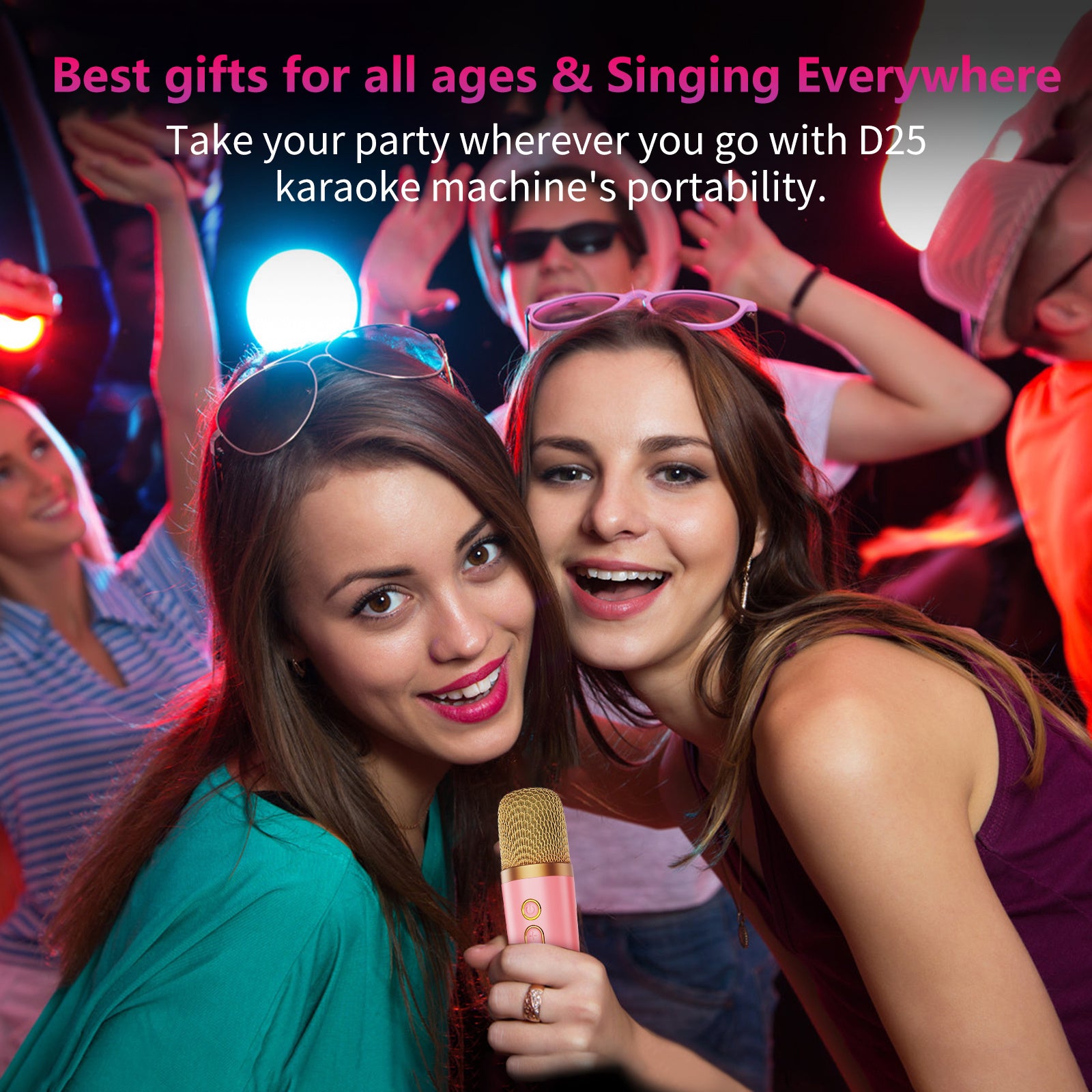 Two women partying and singing into a rose gold mic showcasing a mini karaoke machine with wireless microphones