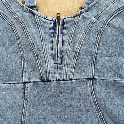 Close-up of Trendsi Denim Bodycon Mini Dress showcasing front zipper and detailed stitching