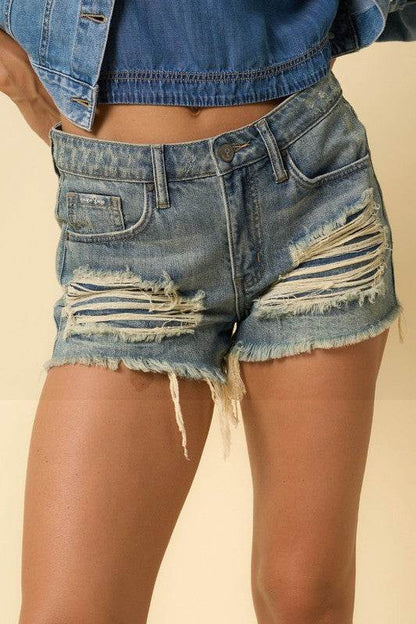 Insane Gene Mid Rise Destroyed Shorts in light blue denim with distressed details for a trendy look