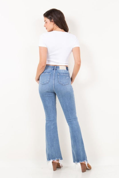 Artemis Vintage women's high rise tummy control jeans light wash flared raw hem back view