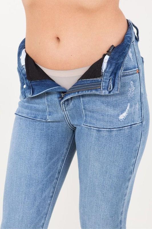 Artemis Vintage women's high rise tummy control jeans light wash with visible tummy panel and open zipper