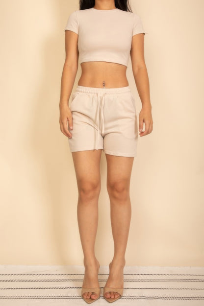 Beige Drawstring Shorts Set featuring a cropped top and comfortable shorts for casual wear