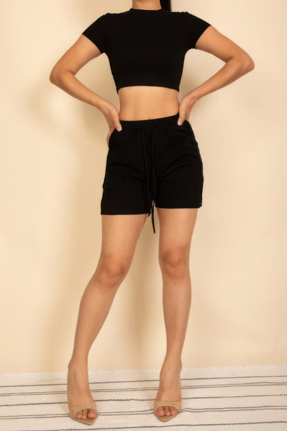 Black Drawstring Shorts Set featuring a cropped top and comfortable shorts for a casual look