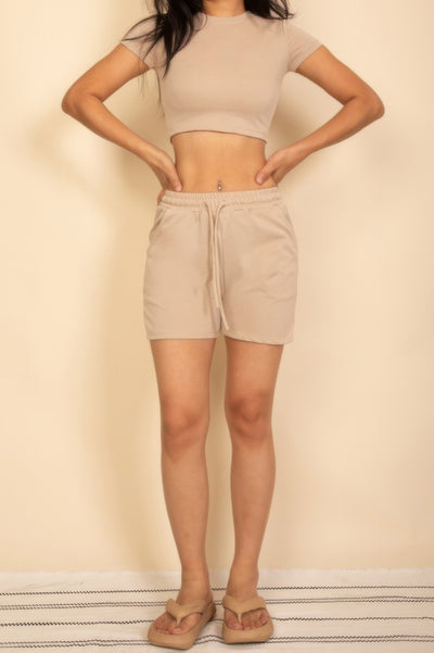 Beige Drawstring Shorts Set featuring a fitted crop top and comfortable shorts for a casual look