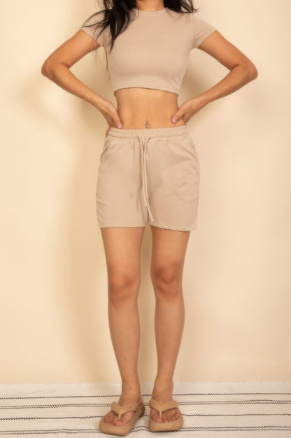 Beige Drawstring Shorts Set featuring a fitted crop top and comfortable shorts for a casual look