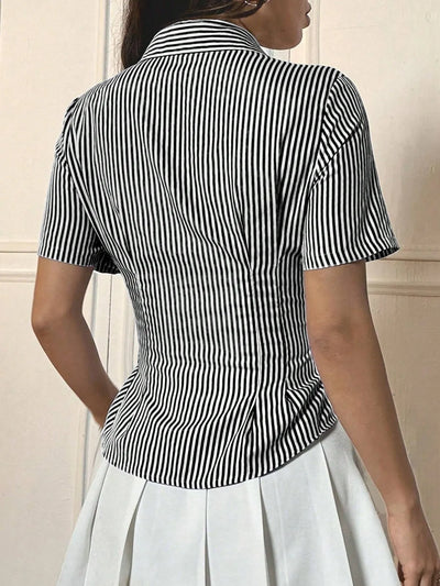 Trendsi black and white vertical striped Short Sleeve Button-Up Shirt back view fitted with collar paired with white pleated skirt
