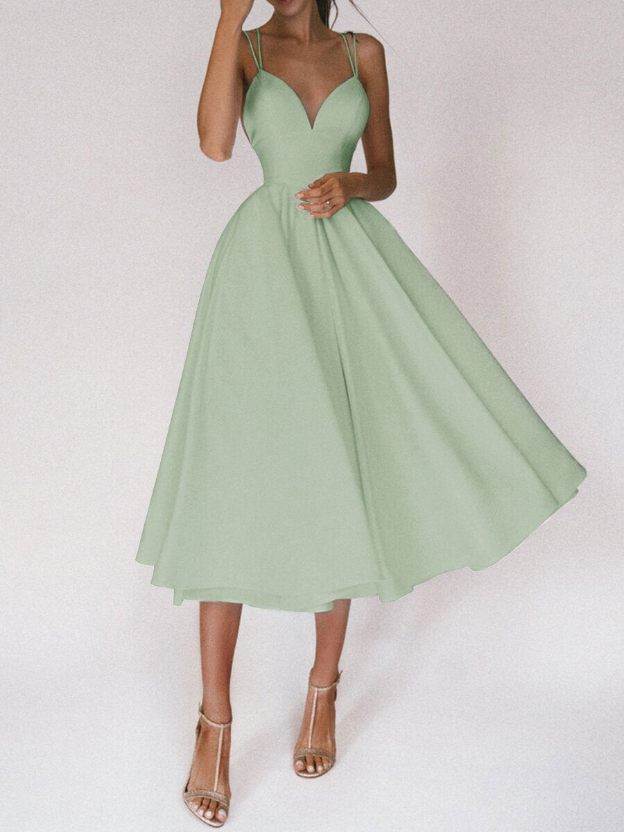 Elegant A-Line Maxi Dress in soft green featuring a flattering sweetheart neckline and flowy skirt