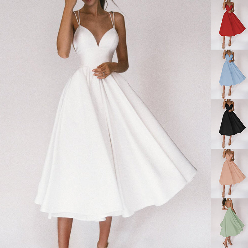 Elegant A-Line Maxi Dress in White with Spaghetti Straps and Flowy Skirt
