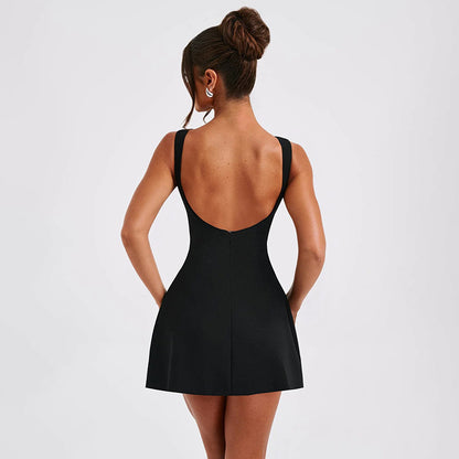 Elegant Black Dress featuring a stylish back design and fitted silhouette for a chic look