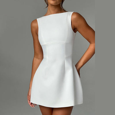 Elegant Black Dress showcased on model, featuring a fitted bodice and flared skirt design