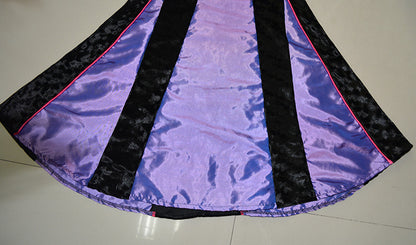 Elegant Villain Costume in purple and black velvet with a flowing skirt and stylish design details