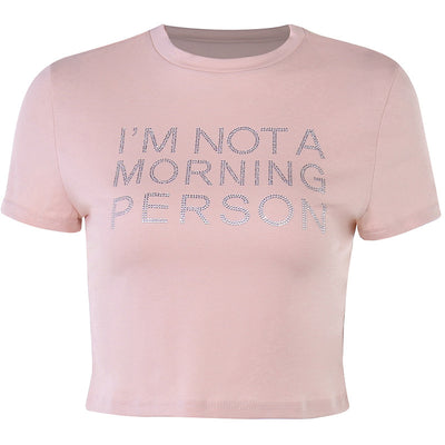 Trendsi light pink Crop T-Shirt short sleeve cropped tee with rhinestone slogan reading IM NOT A MORNING PERSON