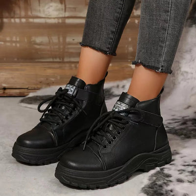 Trendsi black ankle women's lace up platform boots with chunky sole and ankle strap styled with jeans