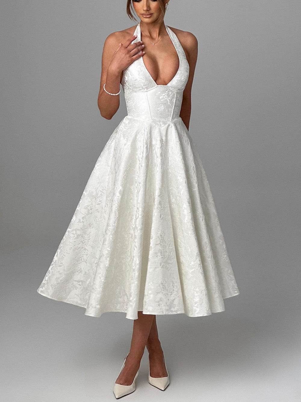 Floral Jacquard Wedding Dress with a Halter Neck and Flared Skirt for Elegant Bridal Moments