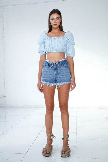 Model wearing Front Ribbon Open Shorts paired with a stylish cropped top for a trendy summer look