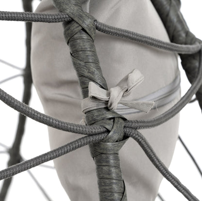 Trendsi outdoor hanging egg chair close up of gray woven rattan frame ropes and tied beige cushion