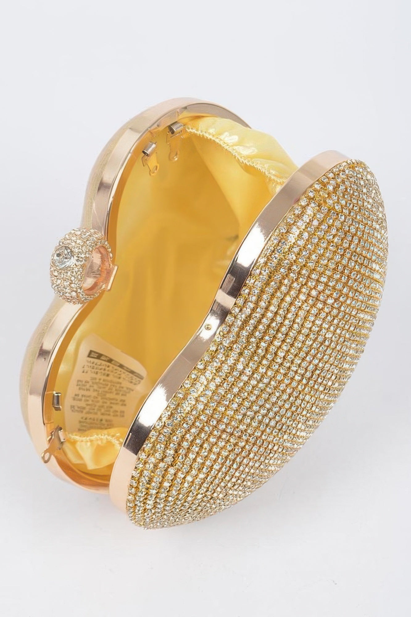 Gold rhinestone Heart Shape Party Clutch with jeweled clasp and satin yellow interior for evening events