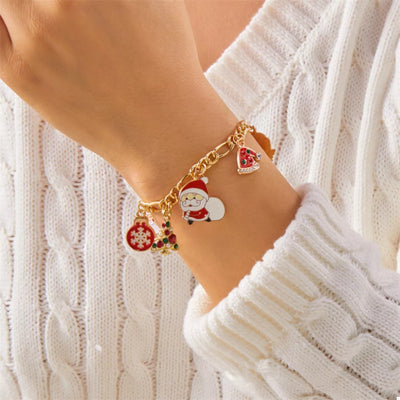 Gold-Plated Charm Bracelet with festive holiday charms including Santa, snowflake, and Christmas tree