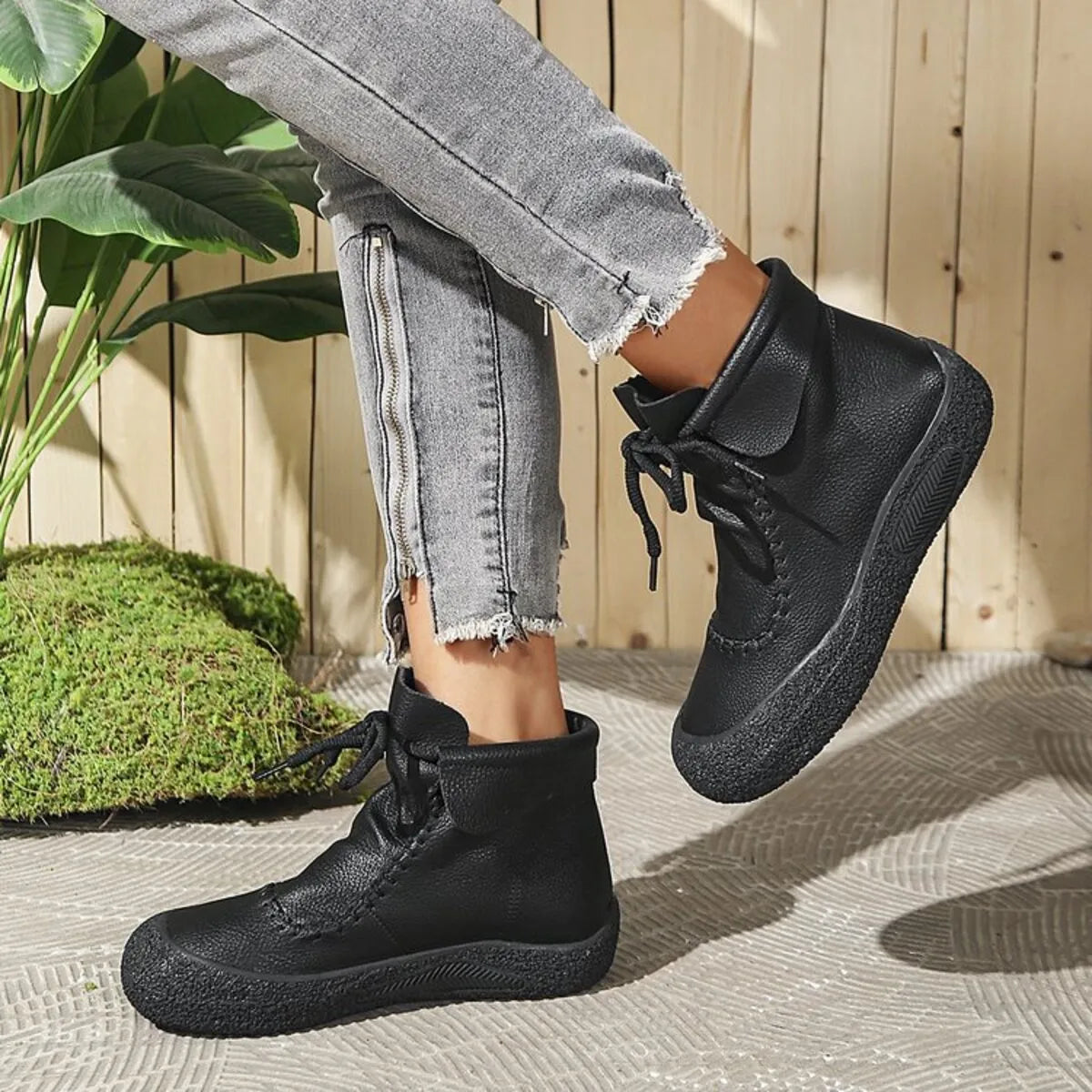 Trendsi black lace-up casual ankle boots worn with gray distressed skinny jeans