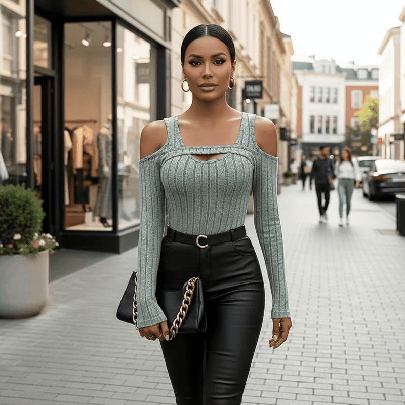 Stylish Long Sleeve Top in green with cut-out shoulders, paired with black leather pants for a chic look