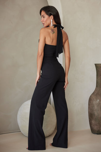 CCWHOLESALECLOTHING black rhinestone halter jumpsuit open back wide leg on model