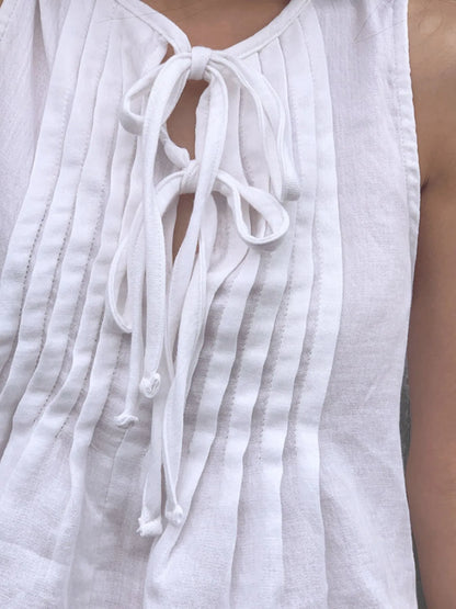 Trendsi white Sleeveless Summer Blouse with front tie pintuck pleats and lightweight linen look for casual wear