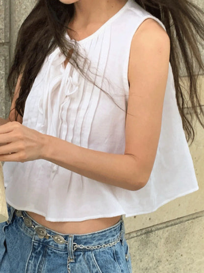 Trendsi white pleated crop top Sleeveless Summer Blouse with airy lightweight fabric and casual denim styling