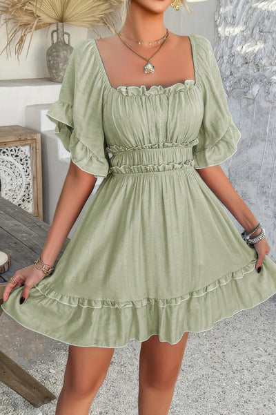 Light sage green off shoulder ruffle trim dress with smocked waist puff sleeves and flared skirt