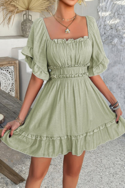 Light sage green off shoulder ruffle trim dress with smocked waist puff sleeves and flared skirt