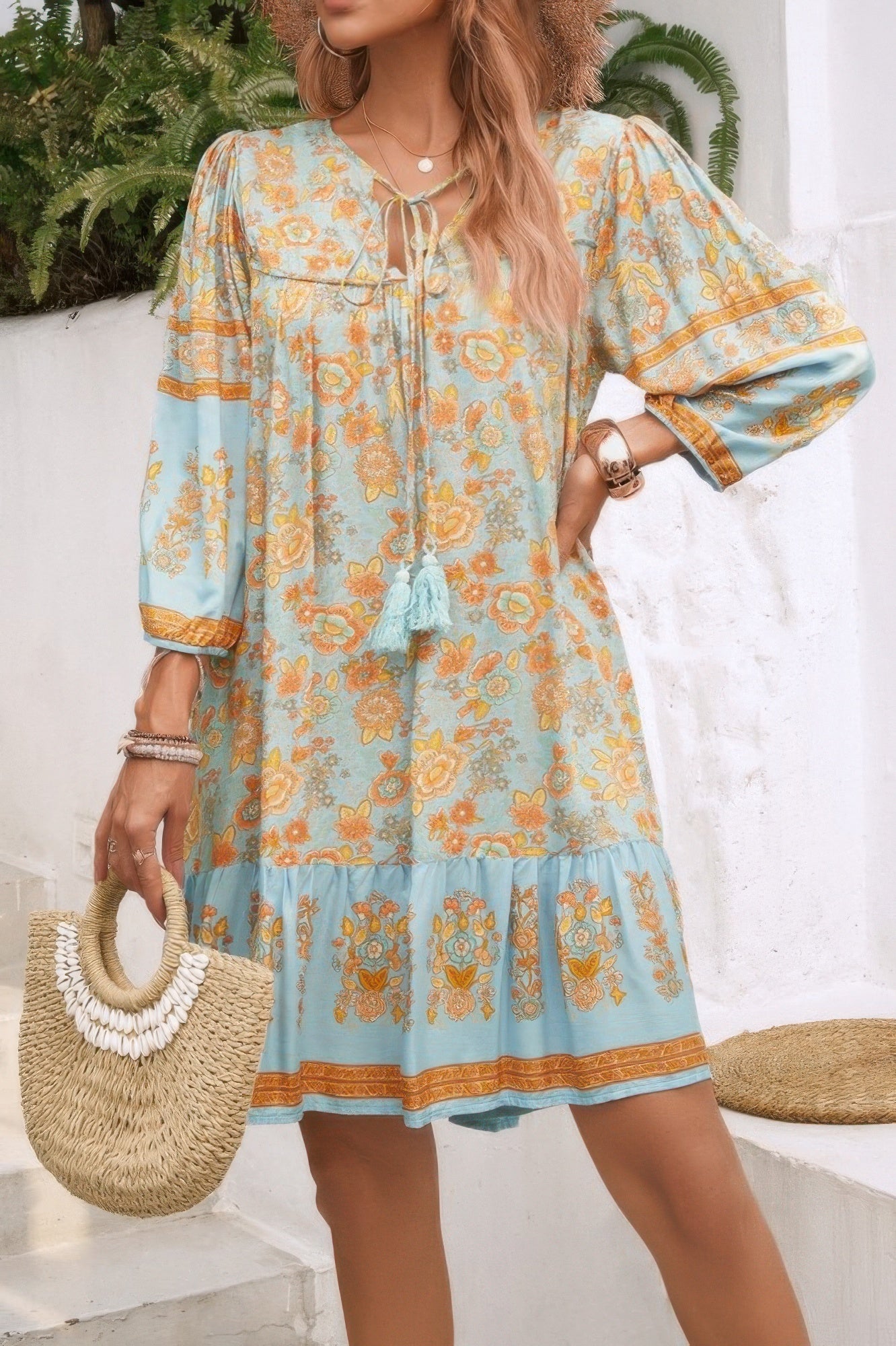 CCWHOLESALECLOTHING boho tassel v neck dress light blue floral tiered hem three quarter sleeves straw bag
