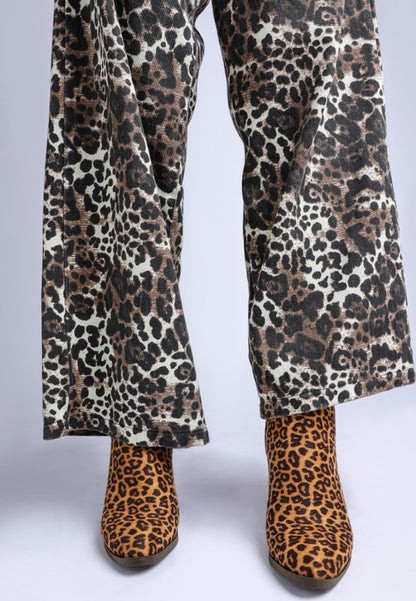 Lunara Leopard Print ankle boots paired with wide-leg leopard print pants by Rag Company